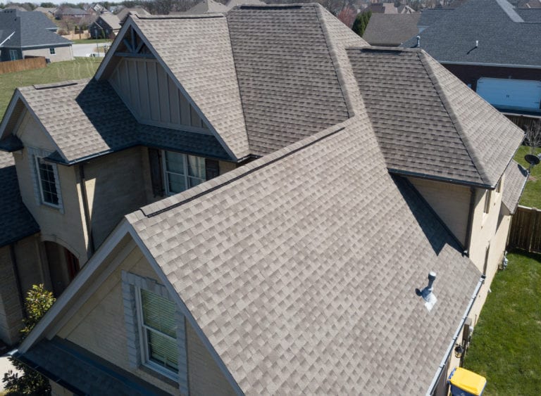 Roofing shingles on a residential home in St. Johns County, showcasing durable materials suitable for hurricane season preparation.